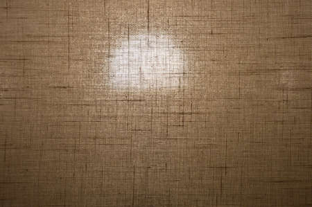 Brown background of floor lamp fabric in a small cage with backlightの写真素材