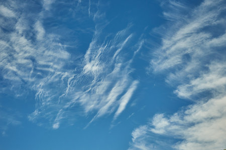 White clouds against a natural blue skyの写真素材