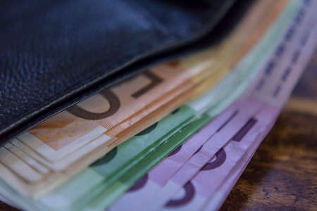 Euro money notes on rustic wooden backgroundの写真素材