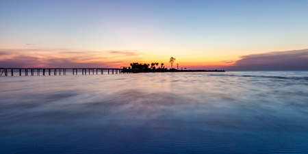 Sunset Seascape with small island  at the coast Albania Kavaje Travel Tip  Europeの写真素材