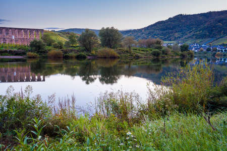 Monatery ruin Stuben and the village Bremm at the Moselle riverside in the evening Germanyの写真素材