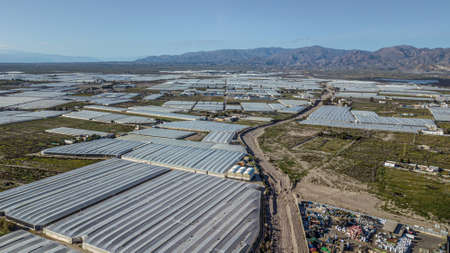 Drone aerial view of the greenhouses in the region of Andalusia Mar del Plastico or Europe's plastic gardenの写真素材