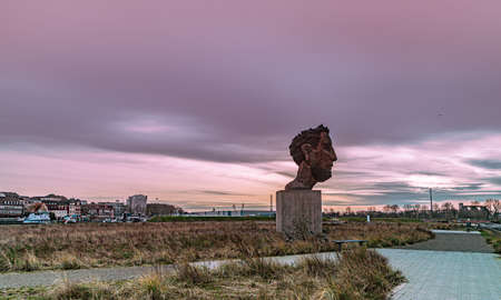 Bronze statue by the sculptor Markus Luepertz  Echo des Poseidon at the port of Duisburg Germanyのeditorial素材