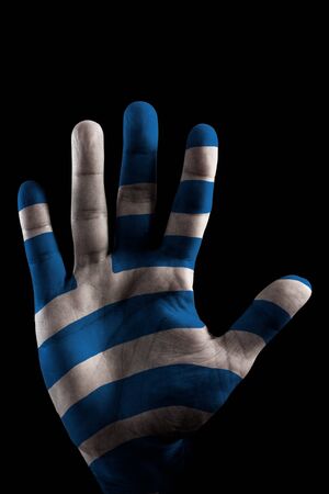 A opened Hand with the Greece Flag painted on it, like saying STOP Crisis の写真素材