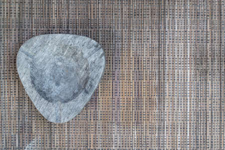 Empthy ashtray on brown woven cloths on the left sideの写真素材