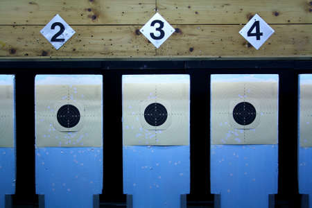 Three rifle targets in a shooting galleryの写真素材