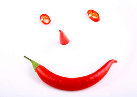 smile face red hot pepper on a plate