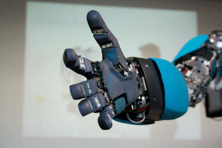 Open blue robot hand will greet gloseupの写真素材