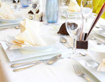 Decorated table in restaurant waiting for guests, horizontalの写真素材