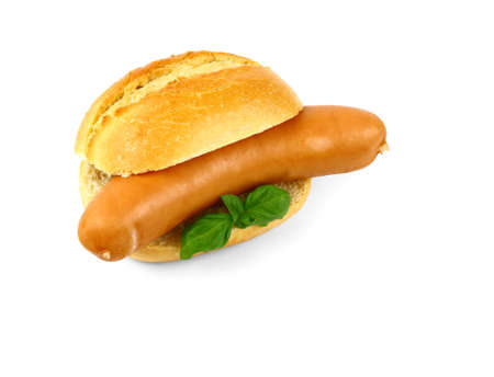German sausage with bun and basil, isolatedの写真素材