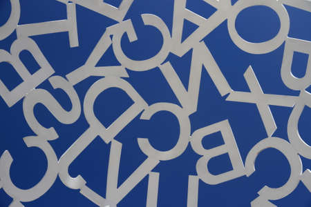ANTIBES, FRANCE - AUG 27, 2014: Sculpture of white steel painted letters as backgroundのeditorial素材