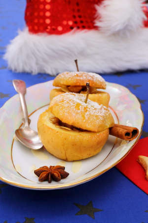 Two baked apples as Christmas dessert, close upの写真素材