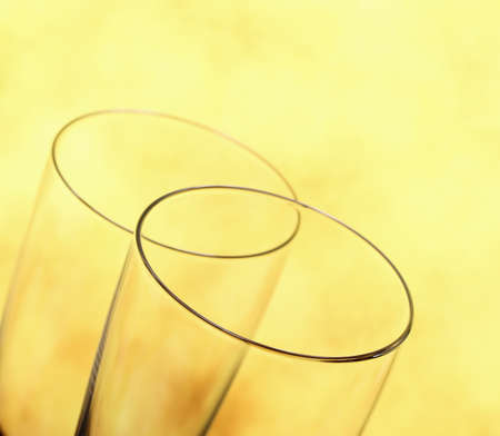 Two Champagne glasses as wedding rings symbol, blurred backgroundの写真素材