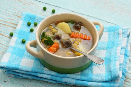 Yellow pea soup, potato and stew meat, top viewの写真素材