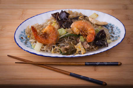 Asia Glass noodles prawn and vegetables on bamboo board top viewの写真素材
