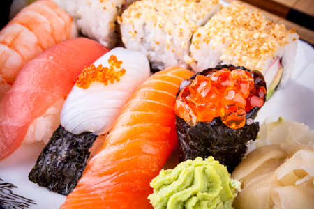 Assortment fish sushi with salmon ikura, close upの写真素材