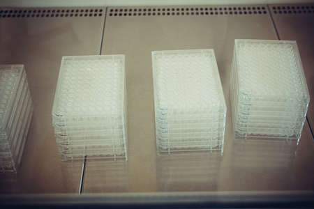 Multiwell platen in flow box as background, soft focusの写真素材