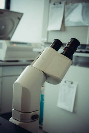 Microscope eyepiece closeup as background, soft focusの写真素材