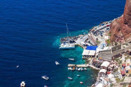 Santorini bay with many tourists, top viewの写真素材