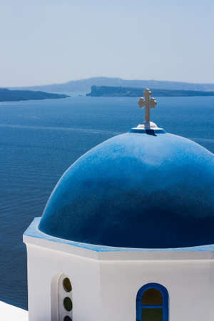 Blue Church Cupola in Santorini, Greece, verticalの写真素材