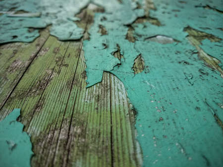 Wood background with old green peeling paint, horizontal viewの写真素材