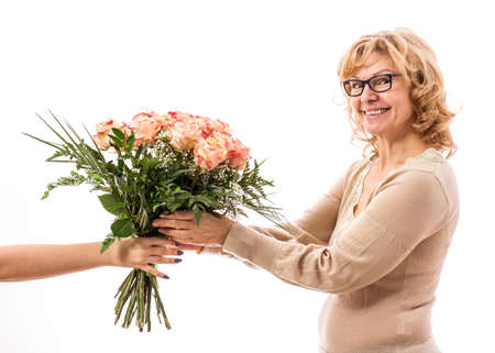 Mature woman gets a boutique, Mother's Day, isolatedの写真素材