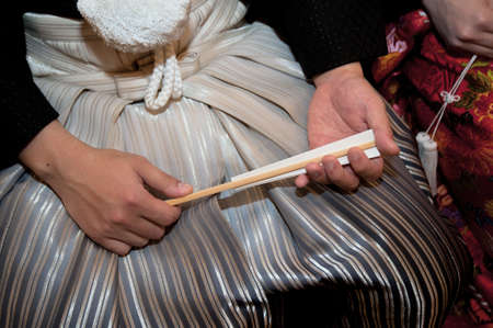 Groom of kimono style crested hakama, Handy fan of kimono accessories is dignified, have been brilliant to haveの写真素材