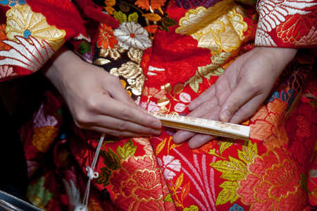 Bride of Iro-daKake, ahead of the wedding, is the bride hand of a little nervous listed at hand sense brilliant of kimono accessoriesの写真素材