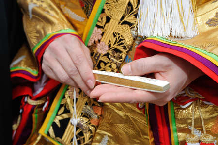 Iro-nai seat of the bride, the hand of fan very gallantの写真素材