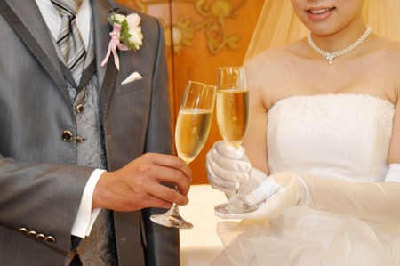 Cheers neat and gorgeous toast at the wedding receptionの写真素材