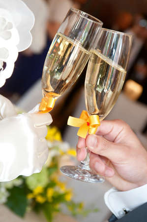 Cheers at the wedding reception the toast of the bride and groomの写真素材