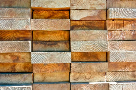 Wood boards stacked highly tightly