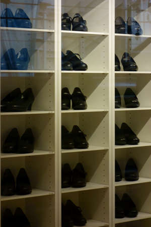 Storefront pattern of fashionable shoe stores in the city, rack sorting serviceの写真素材