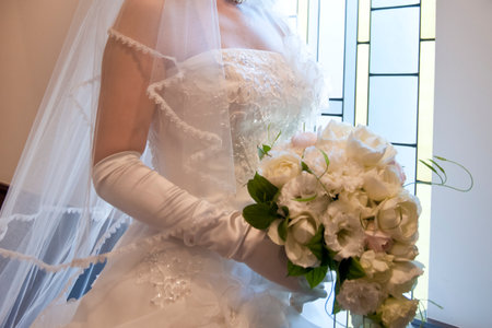 Bridal image, wedding dress beautiful bride with wedding bouquetの写真素材
