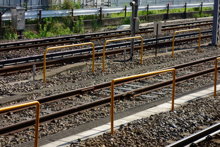 Railway, train tracks seen from the station platformの写真素材