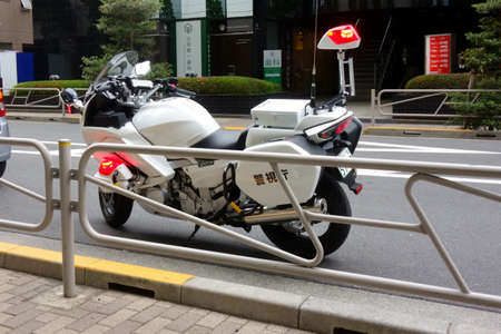 A modern image of a stop on duty, a traffic police motorcycleの写真素材