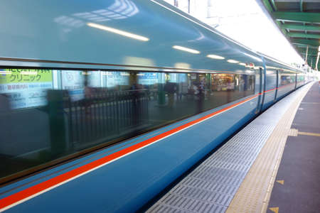 Express train passing danger, modern high speed train motion blurの写真素材