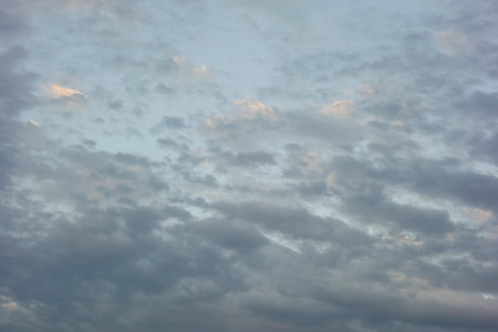 Sea of clouds pattern, beautiful clouds in the glittering sky