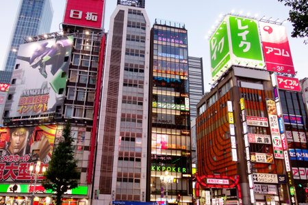 Shinjuku, Tokyo, Japan - August 03, 2023: People walking in the world-famous Shinjuku East Exit, Kabukicho, neon illuminations and the bustling entertainment district of Tokyo.のeditorial素材