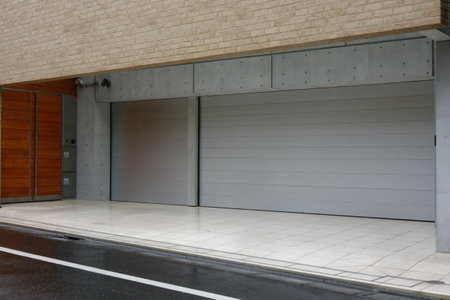 Closed garage door in a luxury modern residential area.の写真素材