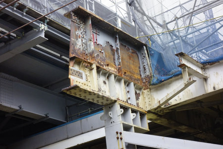 Old rusted steel frame at the reconstruction site