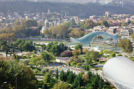 November 6, 2023, Tbilisi, Georgia, trendy symbol landmark, beautiful deformed green Peace Bridge