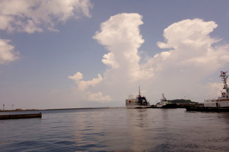 Cumulonimbus clouds, Yokosuka New Port in midsummer, a relaxing port scene around noonの写真素材