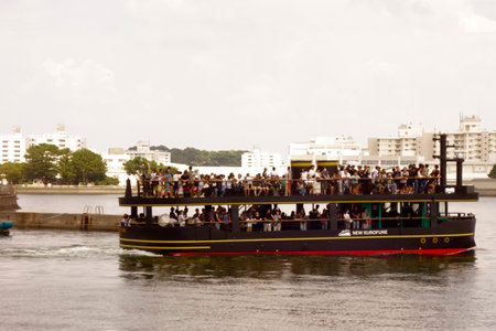 Tourists on a sightseeing boat at Yokosuka Portの写真素材