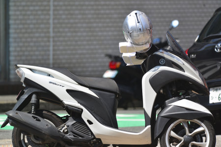 A cool white motorcycle parked in the cityの写真素材