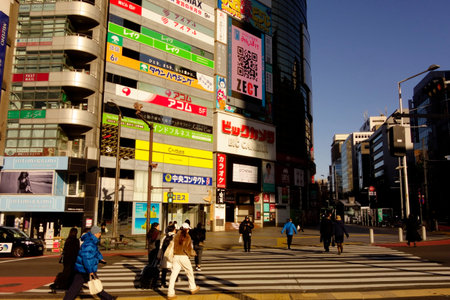 Shibuya, Tokyo, Japan - January 5, 2025: People in front of a commercial building at Miyamasuzaka...