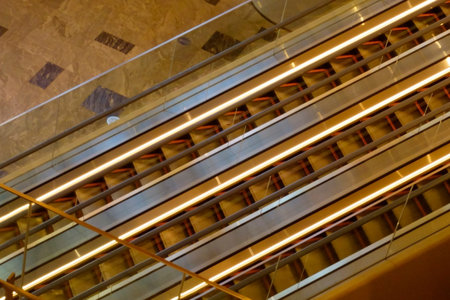 Tokyo, Japan - January 5, 2025: Escalator inside Azabudai Hills, a modern building in Roppongi, Minato Ward.のeditorial素材