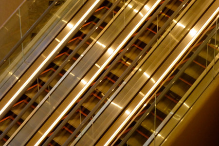Tokyo, Japan - January 5, 2025: Escalator inside Azabudai Hills, a modern building in Roppongi,...