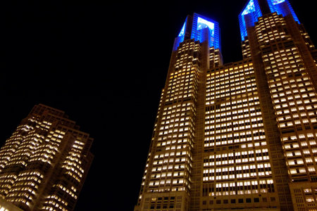 Tokyo, Japan, Shinjuku Metropolitan Government Building - January 8, 2025: Projection mapping of the city's night view projected onto the Metropolitan Government Building.のeditorial素材