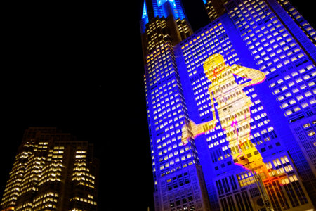 Tokyo, Japan, Shinjuku Metropolitan Government Building - January 8, 2025: Projection mapping of the city's night view projected onto the Metropolitan Government Building.のeditorial素材